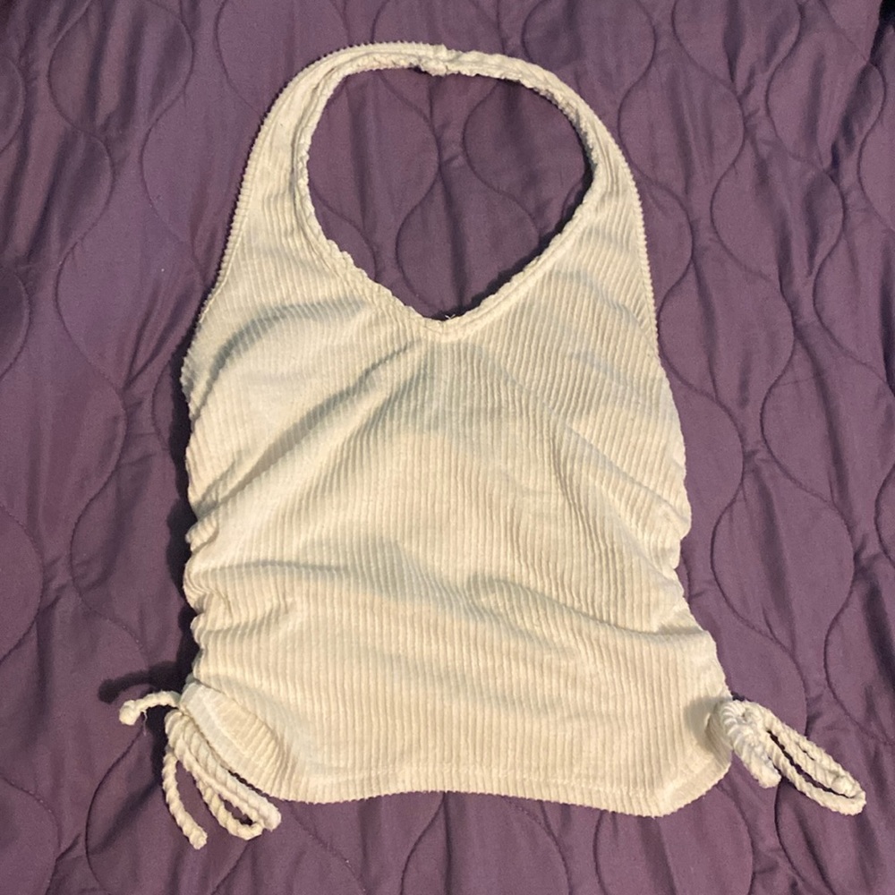 Cropped white halter top with side detailing